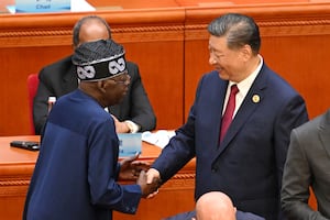 Nigeria's President Bola Ahmed Tinubu (L) is congratulated by Chinese President Xi Jinping after speaking at the opening ceremony of the Forum on China-Africa Cooperation (FOCAC) in Beijing's Great Hall of the People on Sept. 5, 2024.