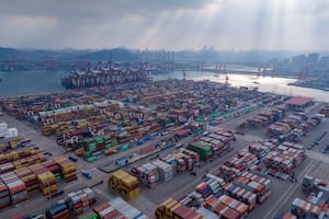 Ships are loaded at the container terminal of the port in Qingdao, in China's eastern Shandong province on Jan. 25, 2025.