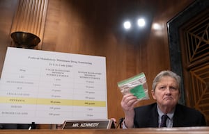 U.S. Senator John Kennedy holds up a bag representing fentanyl during a Senate Banking, Housing, and Urban Affairs Committee hearing in Washington, D.C. on Jan. 11, 2024.