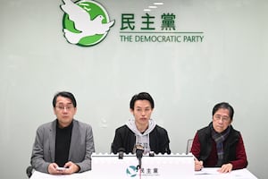 Lo Kin-hei (C), chairman of Hong Kong's Democratic Party (DP), along with other senior leaders, attends a press conference at the party's headquarters in Hong Kong on Feb. 26, 2025 to discuss the budget announcement.