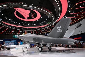 A model of a Chinese-made J-35A stealth fighter is displayed at an AVIC (China Aviation Industry Corporation) stand during the 15th China International Aviation and Aerospace Exhibition in Zhuhai, in southern China's Guangdong province on Nov. 14, 2024.