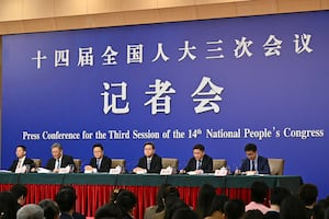 Wu Qing (L), Chairman of the China Securities Regulatory Commission, Wang Wentao (2nd-L), China's Minister of Commerce, Zheng Shanjie (C), Chairman of National Development and Reform Commission of China, Lan Fo'an (3rd-R), China's Minister of Finance and Pan Gongsheng, Governor of People's Bank of China attend a press conference during the second session of the 14th National People's Congress (NPC) in Beijing on March 6, 2025.