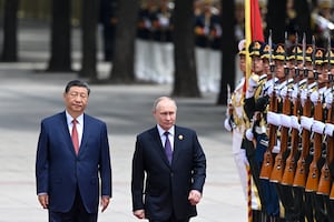 Russia's President Vladimir Putin and China's President Xi Jinping attend an official welcoming ceremony in front of the Great Hall of the People in Tiananmen Square in Beijing on May 16, 2024.