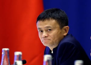 Chinese CEO Jack Ma of Alibaba listens to Chinese President Xi Jinping at a U.S.-China business roundtable, comprised of U.S. and Chinese CEOs in Seattle, Washington Sept. 23, 2015.