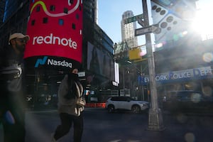 An advertisement for "RedNote," a Chinese social media app, is seen as people walk by the Nasdaq headquarters in Times Square on Jan. 27, 2025 in New York City.