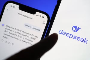 The logo of DeepSeek is displayed alongside its AI assistant app on a mobile phone, in this illustration picture taken Jan. 28, 2025.