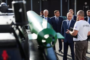 Russia's President Vladimir Putin, accompanied by Defence Minister Andrei Belousov, Presidential Aide and State Council Secretary Alexei Dyumin, First Deputy Prime Minister Denis Manturov and Deputy Head of the Russian Presidential Administration Maxim Oreshkin, visits a drone production facility of the the Special Technology Centre in Saint Petersburg, Russia Sept. 19, 2024.