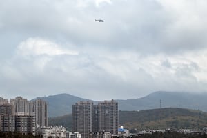 A Chinese military helicopter flies over Pingtan island, the closest point in China to Taiwan's main island, in Fujian province on May 19, 2024.