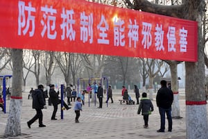 Part of a propaganda banner which reads, "Prevent and reject the Church of Almighty God's cult invasions", is seen at an outdoor exercising court, in Puyang, Henan province, China, in this file picture taken Jan. 12, 2012.